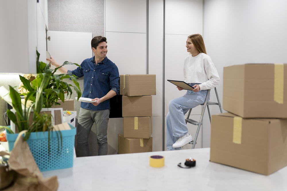 couple-unpacking-their-belongings